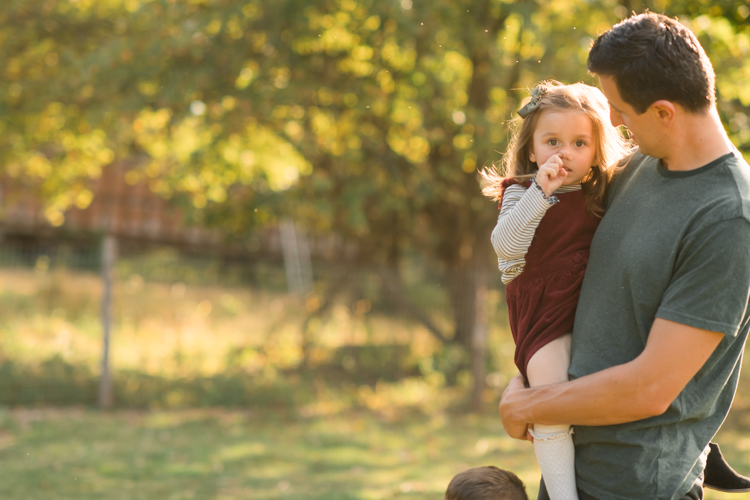 Fall is in full swing here in NJ, my first Fall Family session with Anna and Adam at their Farm House in Hackettstown NJ. Anna and Adam recently purchased their dream farm house on a 4 acres of land. This family of four now has chickens, ducks, birds, cats, a dog, sheep and plans to add many more to the list in the future. I had the honor of visiting Anna and Adam and their two beautiful children at their Farm the other day. I got much need vitamin D walking around the property, enjoying the foliage, running around with their kids and meeting all the farm animals. I sincerely enjoy photographing families now because there are no dull moments with kids, every moment is perfect! Fall family session at Anna and Adam’s Farm at Hackettstown NJ photographed by Karis from HeyKaris.